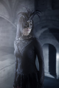 Dark lady with a mask in the castle, photo manipulation 