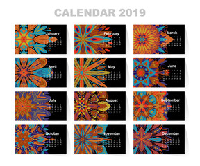 Calendar for 2019 year. Vintage decorative mandala elements. Week starts on sunday. Vintage style template for your design.