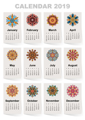 Calendar for 2019 year. Vintage decorative mandala elements. Week starts on sunday. Vintage style template for your design.