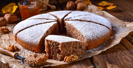 Fresh and tasty autumnal walnut cake with honey