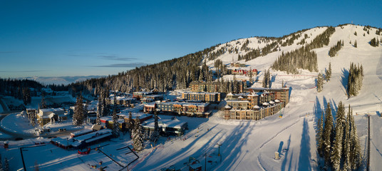 Aerial photo of skiing resort an sunrise