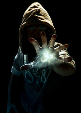 Magic spell's wizard with six fingers, photo manipulation
