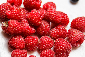 Fresh and sweet raspberries background