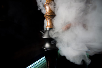 beautiful brown-black hookah in smoke copyscape