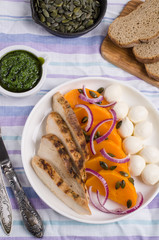 Pumpkin slices with meat and mozzarella