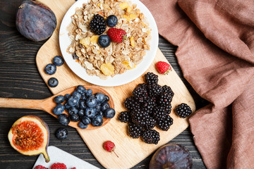 Healthy breakfast with muesli and berries. Top view, flat lay