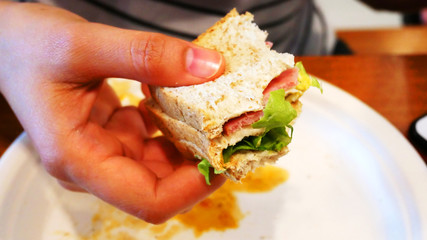 Eating breakfast at restaurant.