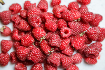 Fresh and sweet raspberries background