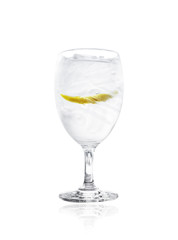 Lemon in wine glass white background 