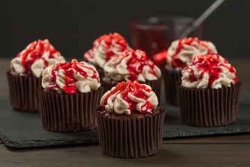 Halloween Cupcakes. Blood Topping, Whipped Cream, Chocolate. Home Baked.