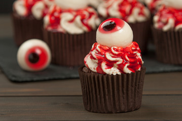 Halloween Cupcakes With Eyeballs. Blood Topping. Home Baked.