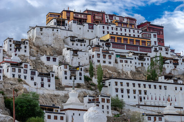 Naklejka premium Building of Thiksey Monastery with Mountain background in Summer Leh, Ladakh, Jammu and Kashmir, India