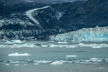 Icebergs near Columbia glacier under the clouds, Alaska