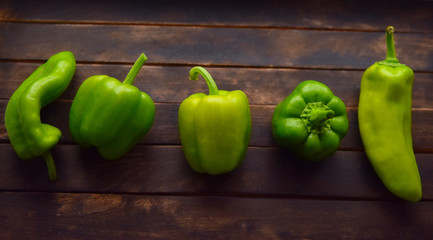 green bell pepper on wooden table
