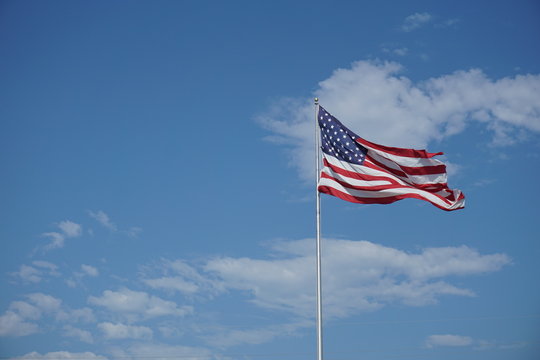 American Flag waving with cloud