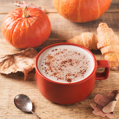 Cup of pumpkin latte, autumn fall mood