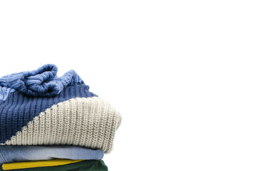 A pile of clothes is on a white background