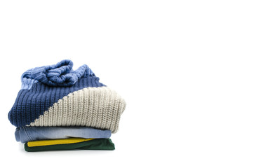 A pile of clothes is on a white background