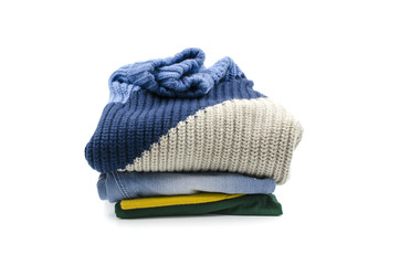 A pile of clothes is on a white background