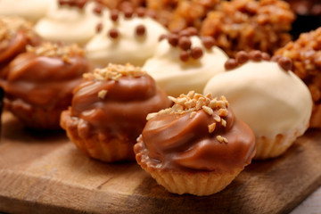 Catering sweets, closeup of various kinds of cakes on event or wedding reception