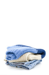 A pile of clothes is on a white background