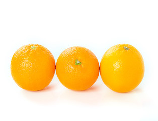 Three oranges. Set of fresh whole orange. Group citrus fruit isolated on white background.