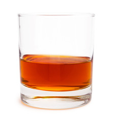 Glass of scotch whiskey isolated on white background