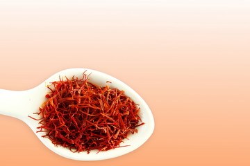 saffron in spoon for food and flavor extract concept,flat lay