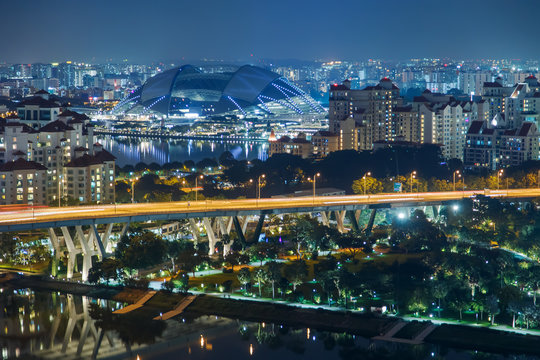 Singapore skyline. National Stadium. Aerial view to illuminated city at night
