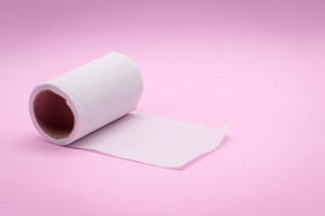 Tissue Roll on pink pastel background for the idea concept minimalist style