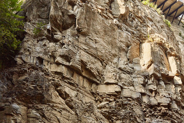 rocky wall. A wall of stones. Texture. Background