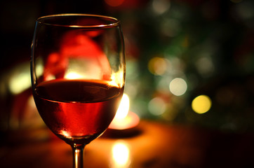 Wine glasses and gifts on candlelit warmth of happiness, Happy New Year and Valentine's Day