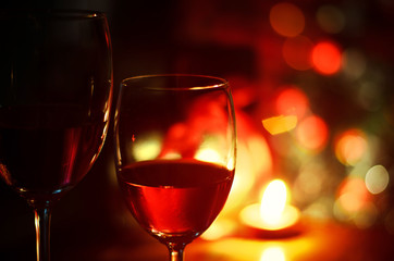 Wine glasses and gifts on candlelit warmth of happiness, Happy New Year and Valentine's Day