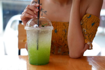 kiwi soda on table