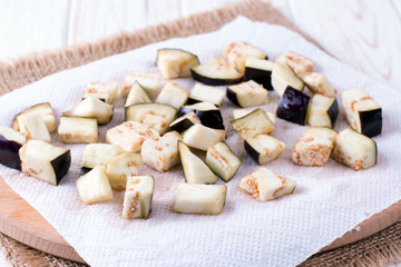Eggplant cubes on a paper towel