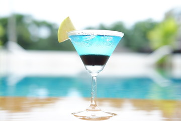 Blue daiquiri cocktails at swimming pool