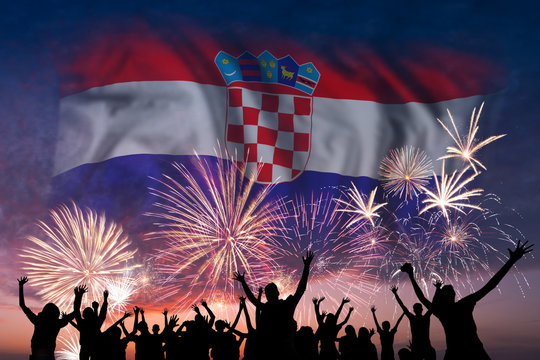 People are looking on fireworks and flag of Croatia - Powered by Adobe