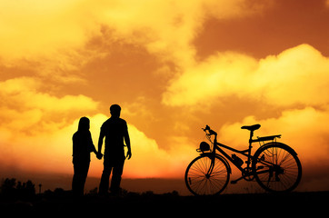 Silhouette of sweet couple in love happy time in beautiful sunset