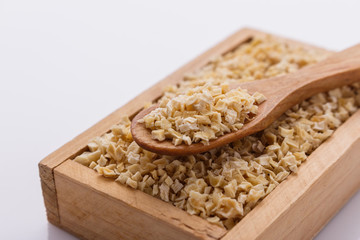 fragrant dried parsnip on a white acrylic background