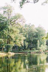 Parks without people in St. Petersburg, summer landscapes and trees. Bridges and lake, old Park. Environmentally friendly and clean, among the city