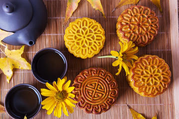 Mooncake and tea on table. Chinese traditional festival, Mid-Autumn Festival Food