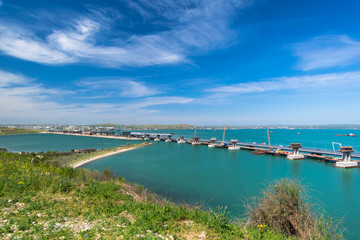 Fototapeta na wymiar Construction of the Crimean bridge in Kerch Strait in a day