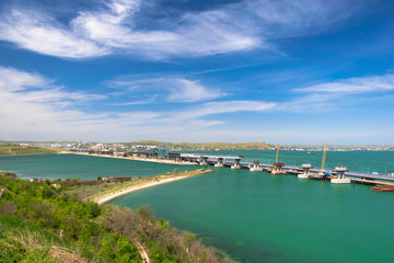 Fototapeta na wymiar Construction of the Crimean bridge in Kerch Strait in a day