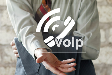 Businessman click button telephone VOIP on touch screen global network.