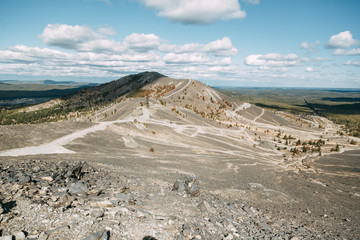 The dirtiest city, with a terrible landscape and plant. The problem of ecology and mountains of industrial waste. Coal rocks
