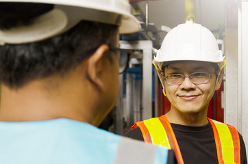 Engineers and business people are checking the plant to a joint venture business