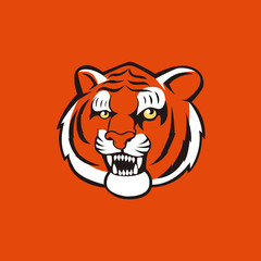 Modern professional logo for sport team. Tiger mascot. Tigers, vector symbol on a dark background.