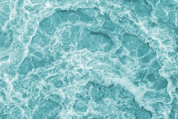 Aerial view of strong water waves