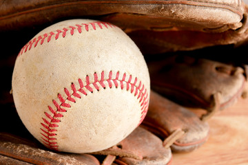 Sports Equipment old Baseball on wood background