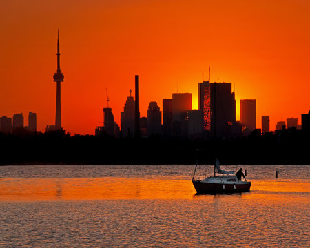 Coming home at sunset from a day out sailing on Lake Ontario at Ashbridges Bay in Toronto Canada